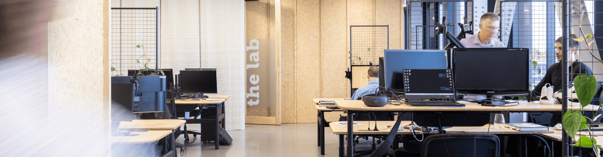 Open-plan office workspace with premium office furniture and collaborative meeting areas